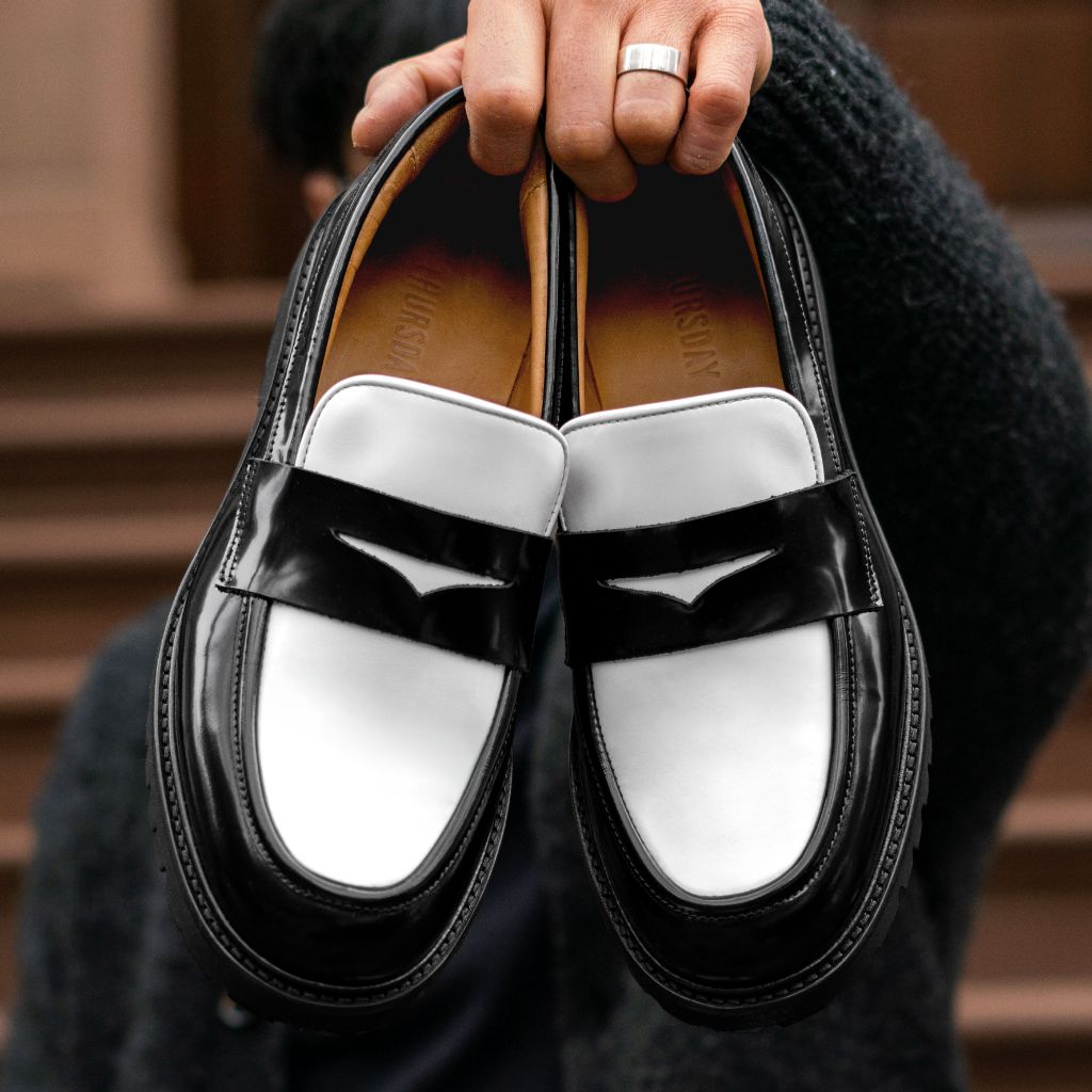 Men's Penny Lug Sole Loafer In Black & White Leather - Thursday