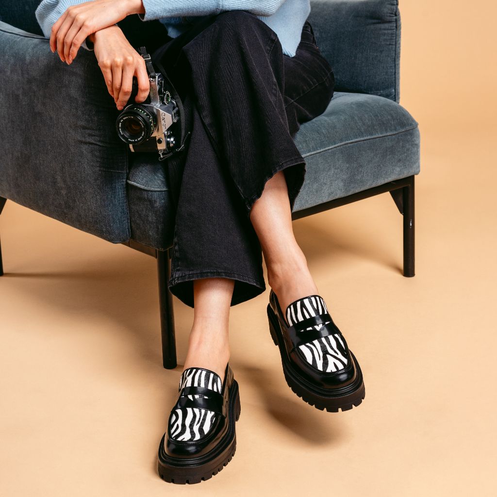 Women's Penny Platform Lug Sole Loafer In Zebra Print - Thursday