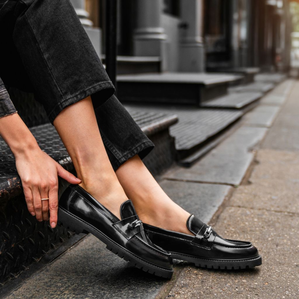 Women's Penny Lug Sole Loafer In Black & Silver - Thursday