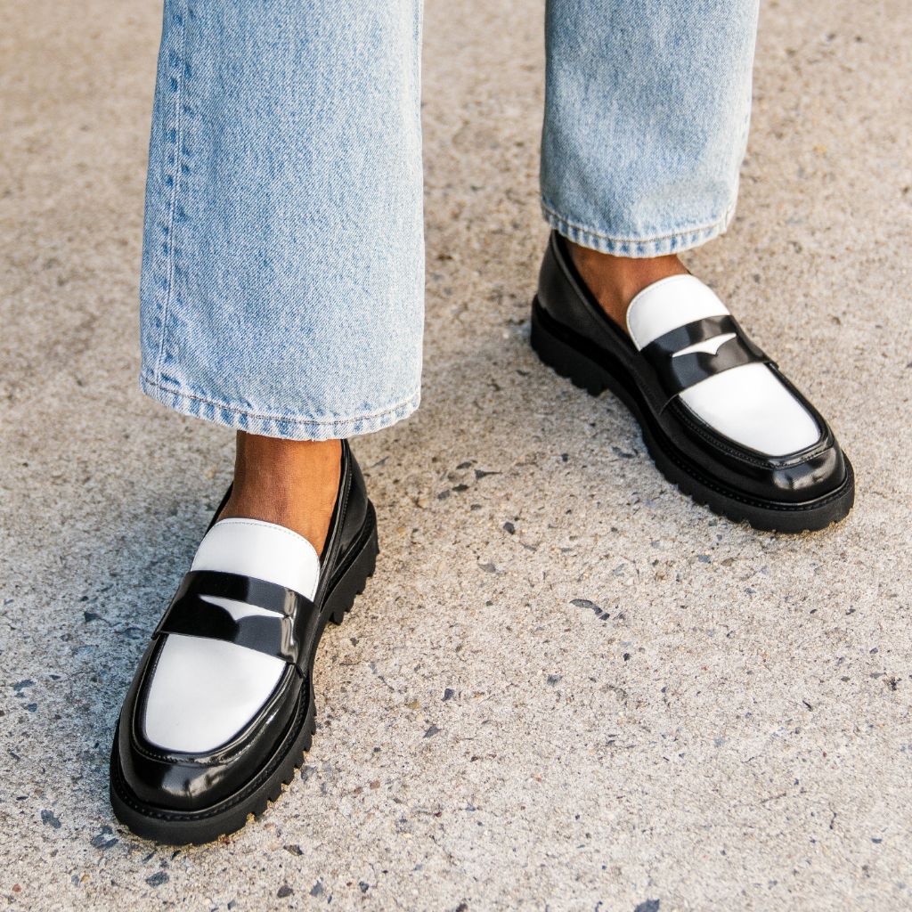 Women’s Penny Lug Sole Loafer In Black & White Leather - Thursday