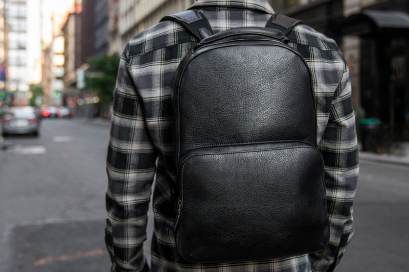 Black leather backpack on sale