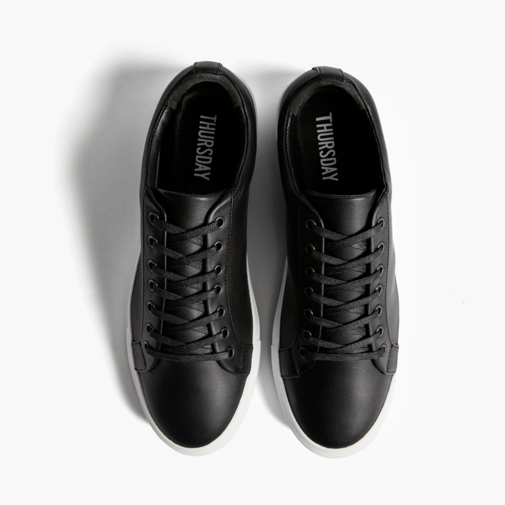 Buy Puma Mens Melanite Slip on Black-White Sneaker - 6 UK (39185801) at  Amazon.in